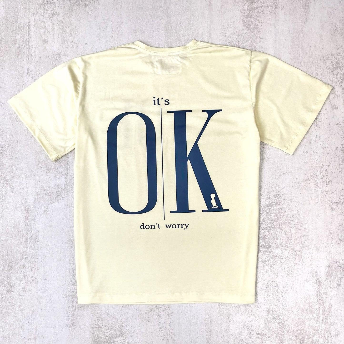 REMERA DOBLE ESTAMPA "IT'S OK" COLOR AMARILLO CLARO OVERSIZE