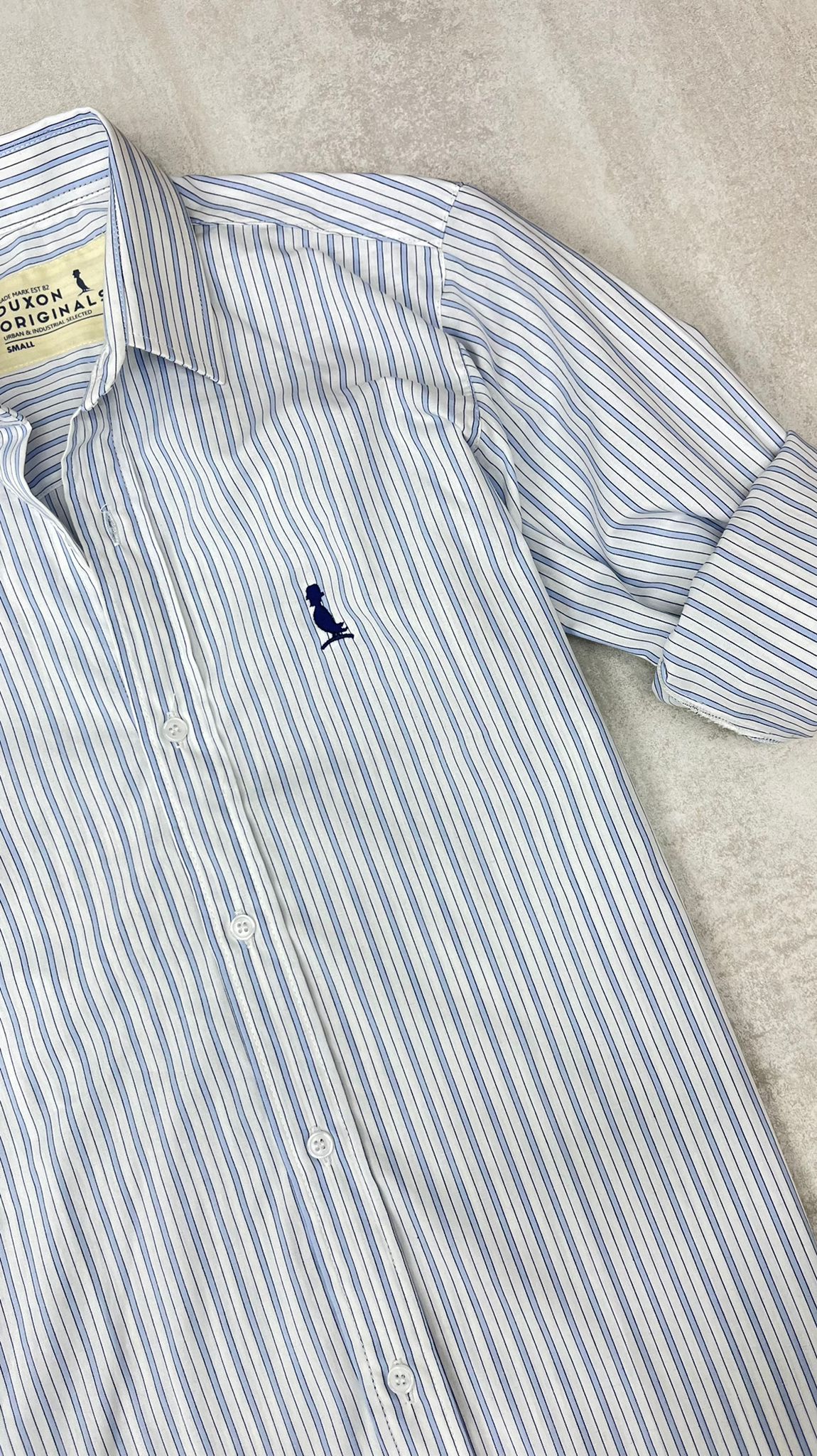 CAMISA A RAYAS FINAS CELESTE Y MARINO