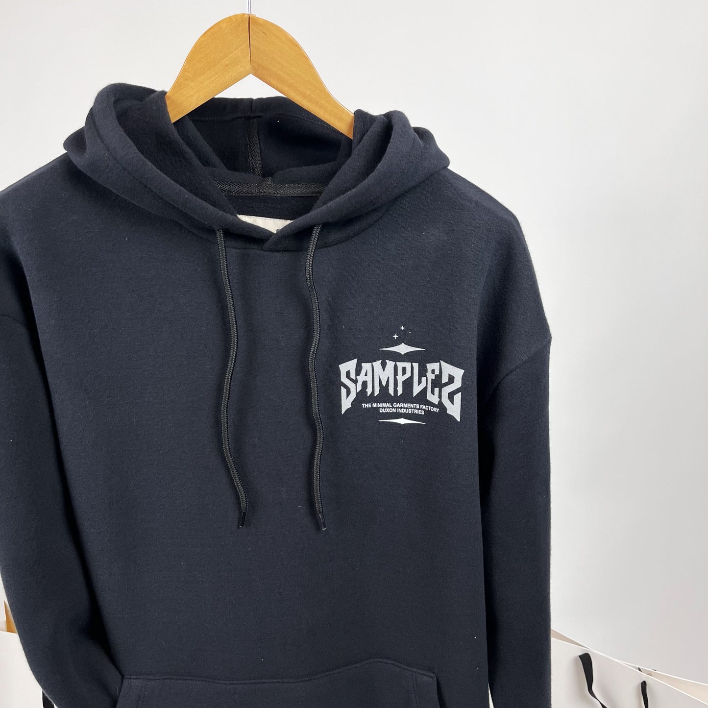 Canguro OVERSIZE doble estampa “Sample” color negro