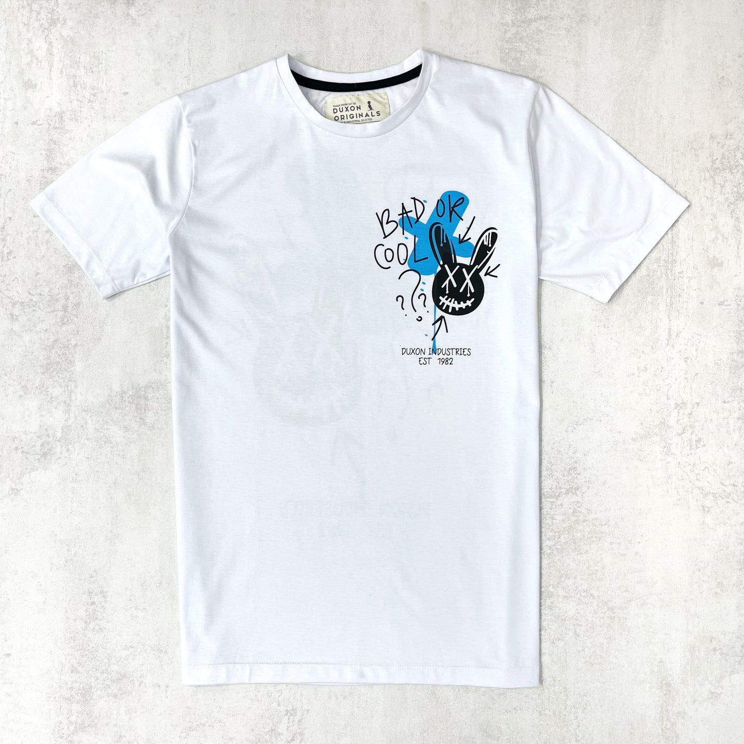 REMERA “BAD OR COOL” DOBLE ESTAMPA, COLOR BLANCO.