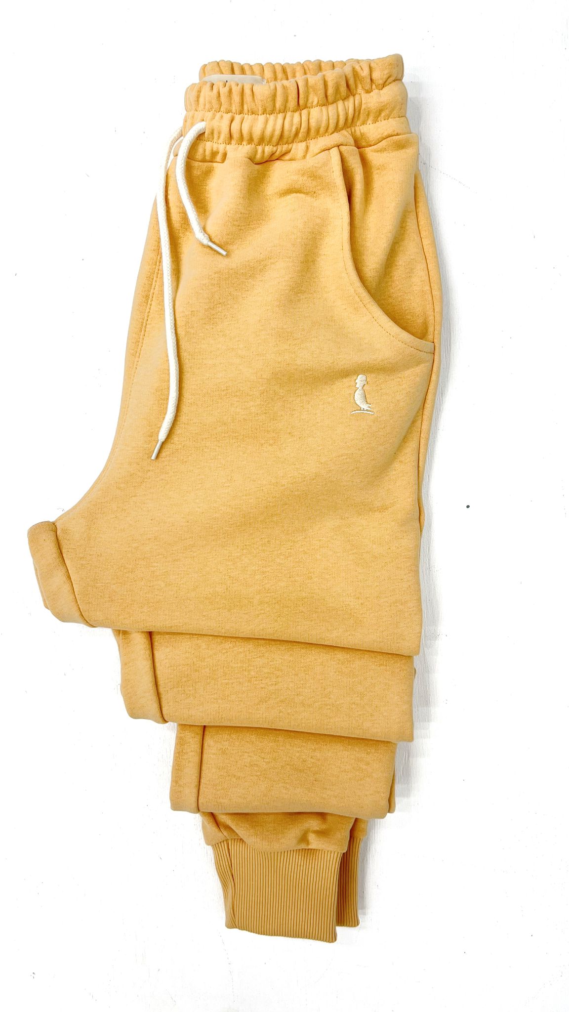 PANTALON JOGGER CON PUÑO NARANJA