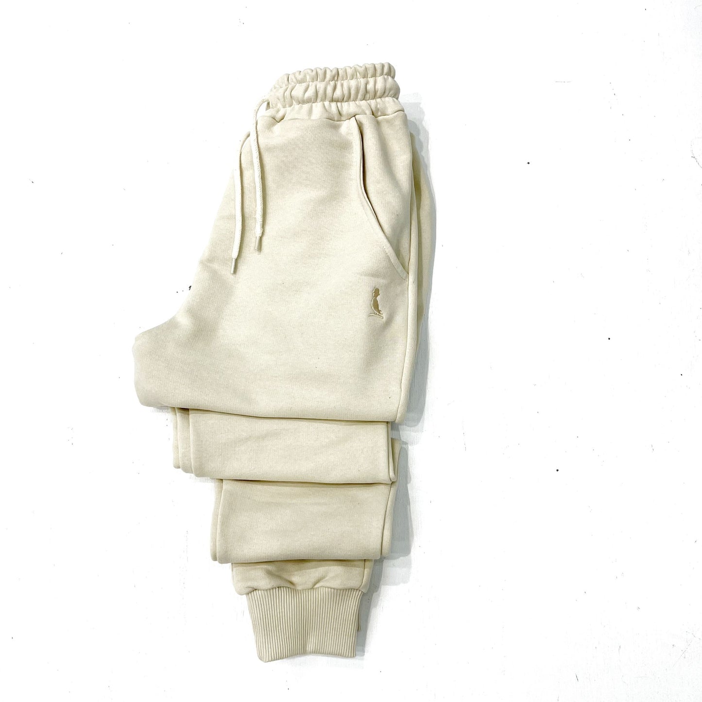 PANTALON JOGGER CON PUÑO BEIGE