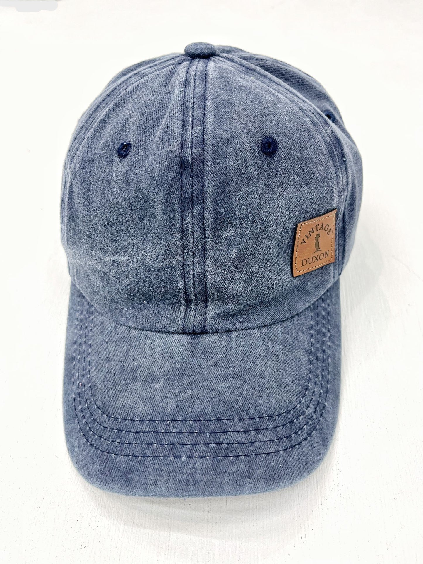 GORRA CON VISERA AZUL
