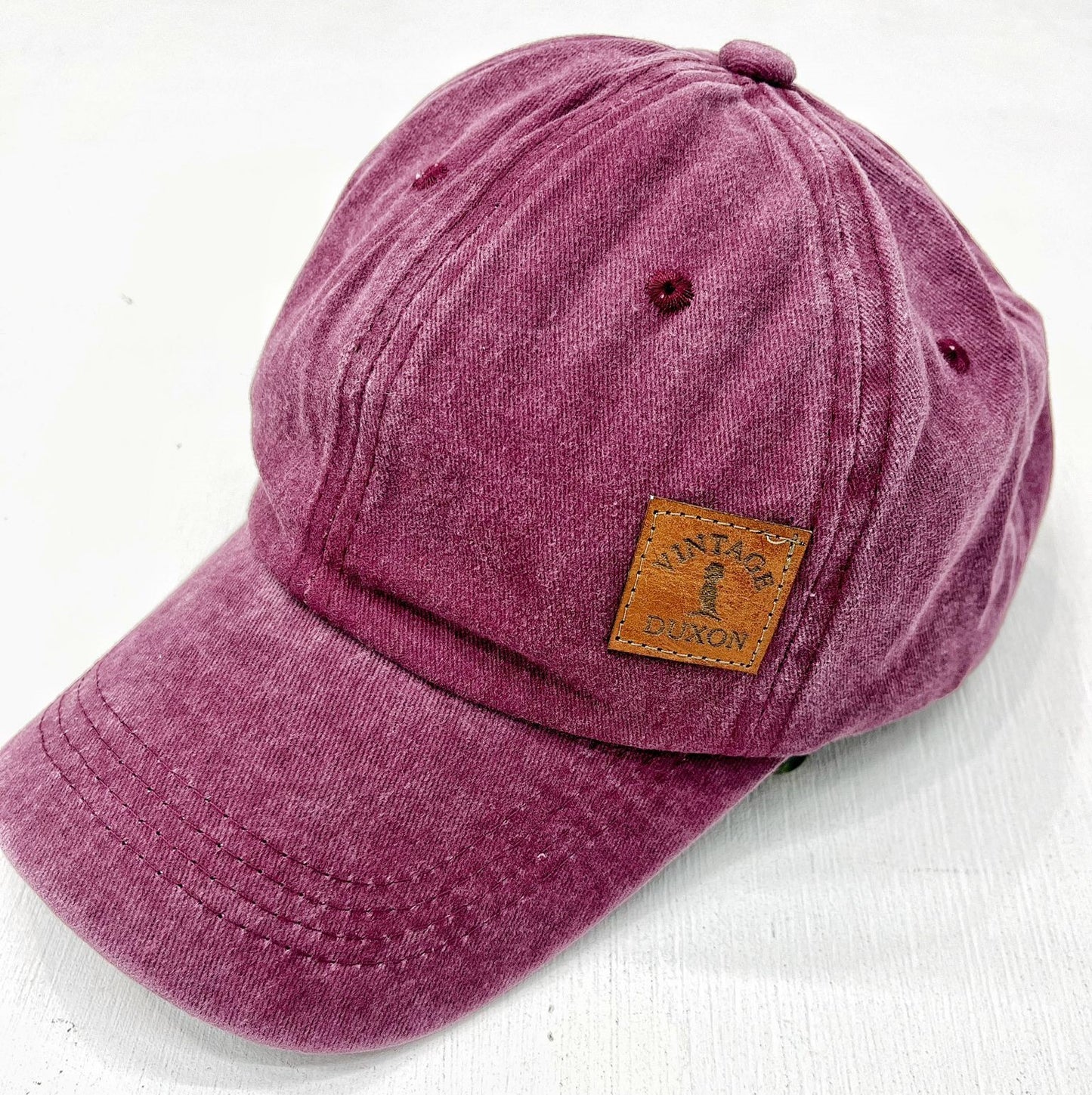 GORRA CON VISERA BORDO