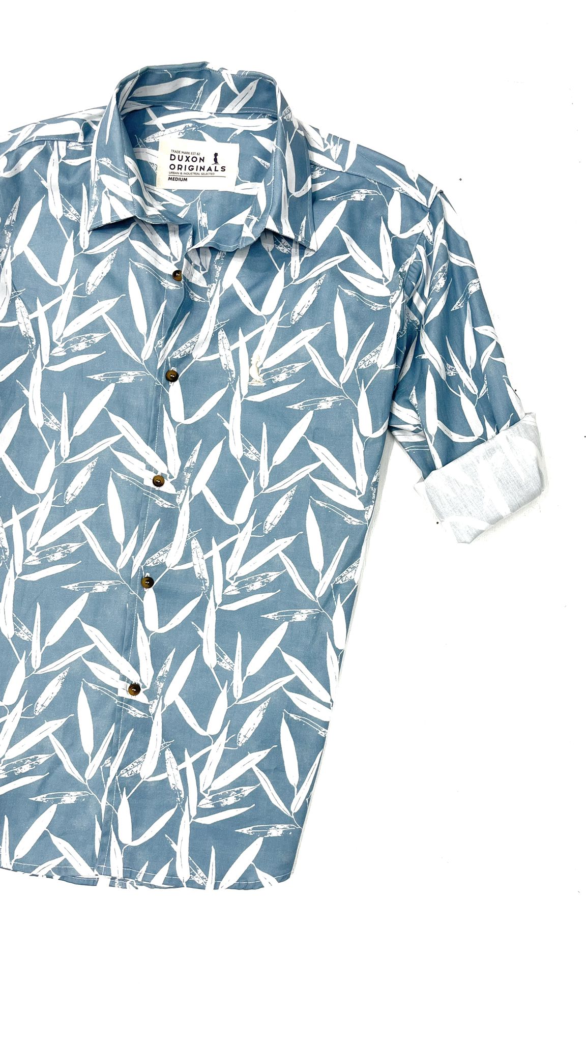 CAMISA ESTAMPADA HOJAS CELESTE