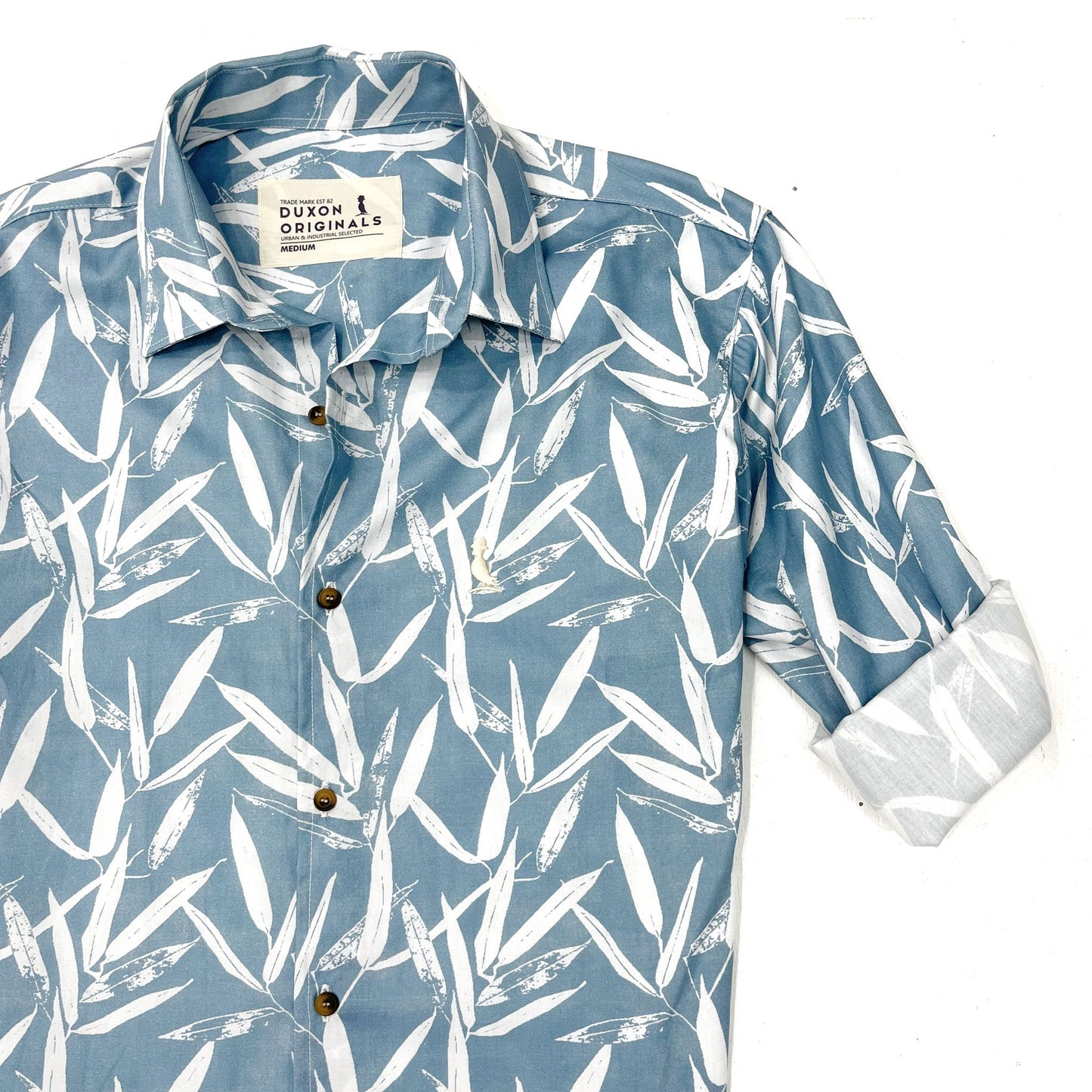 CAMISA ESTAMPADA HOJAS CELESTE