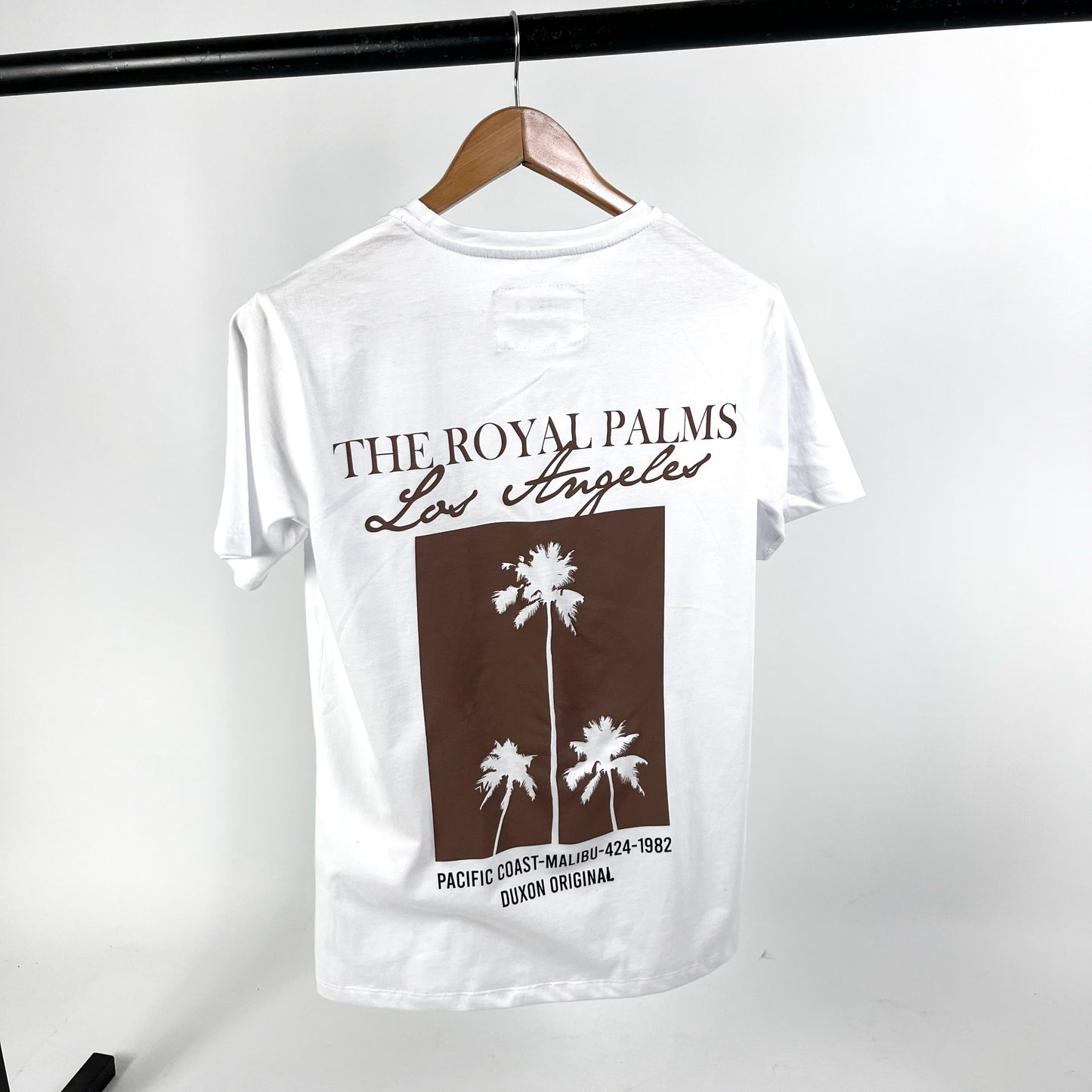 REMERA “The ROYAL palms” color blanco