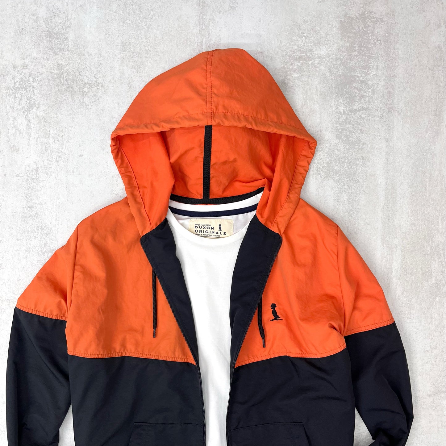 CAMPERA DE NYLON “GLAM” NARANJA CON NEGRO