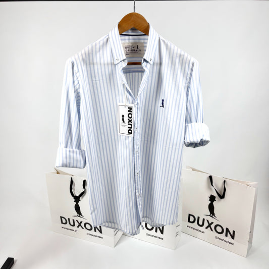 Camisa “Orox” a rayas en celeste.