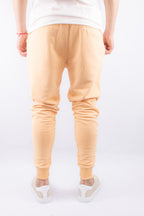 PANTALON JOGGER CON PUÑO NARANJA