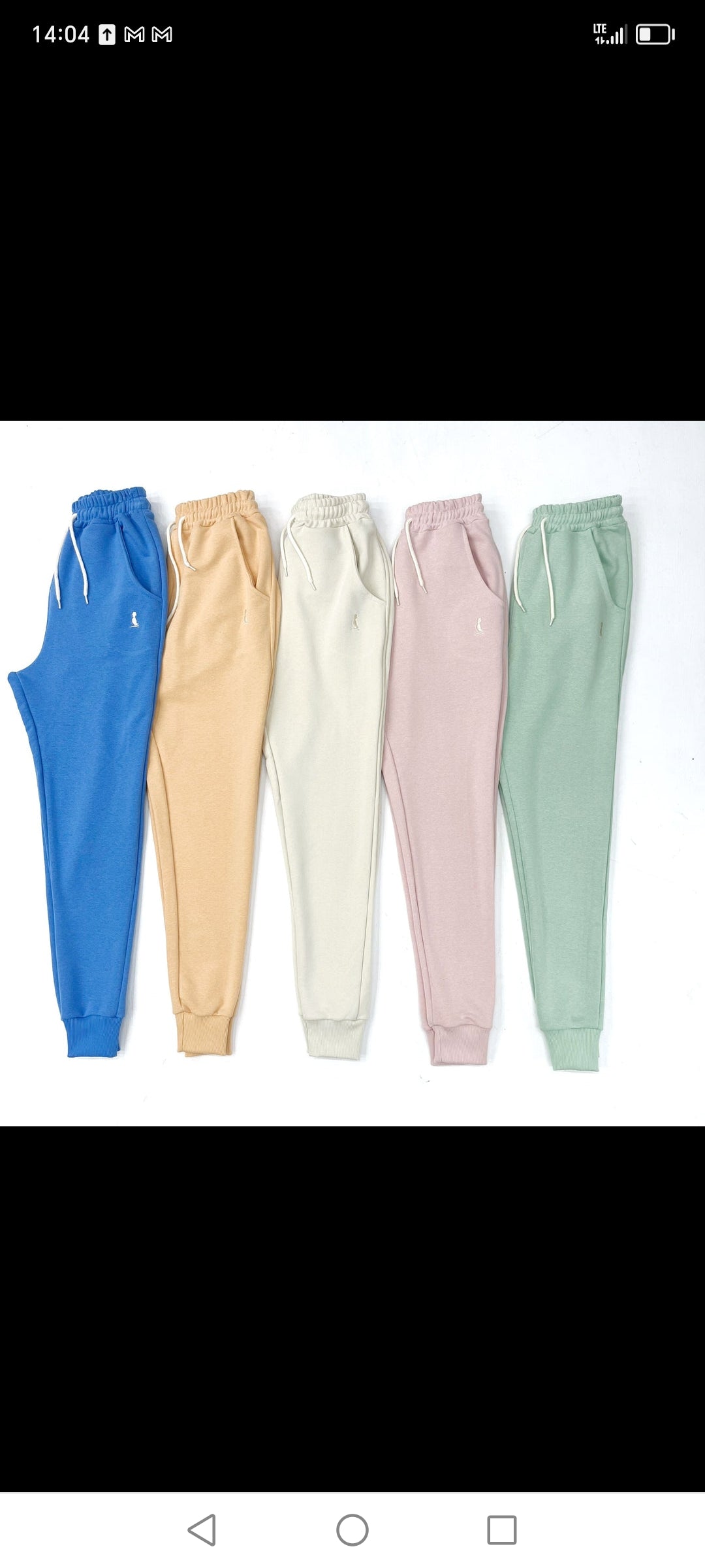PANTALON JOGGER CON PUÑO VERDE CLARO
