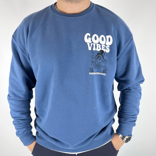 BUZO OVERSIZE DOBLE ESTAMPA "GOOD VIBES", AZUL.