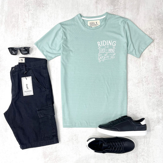 REMERA DOBLE ESTAMPA "RIDING IS A STATE OF MIND" COLOR VERDE AGUA.