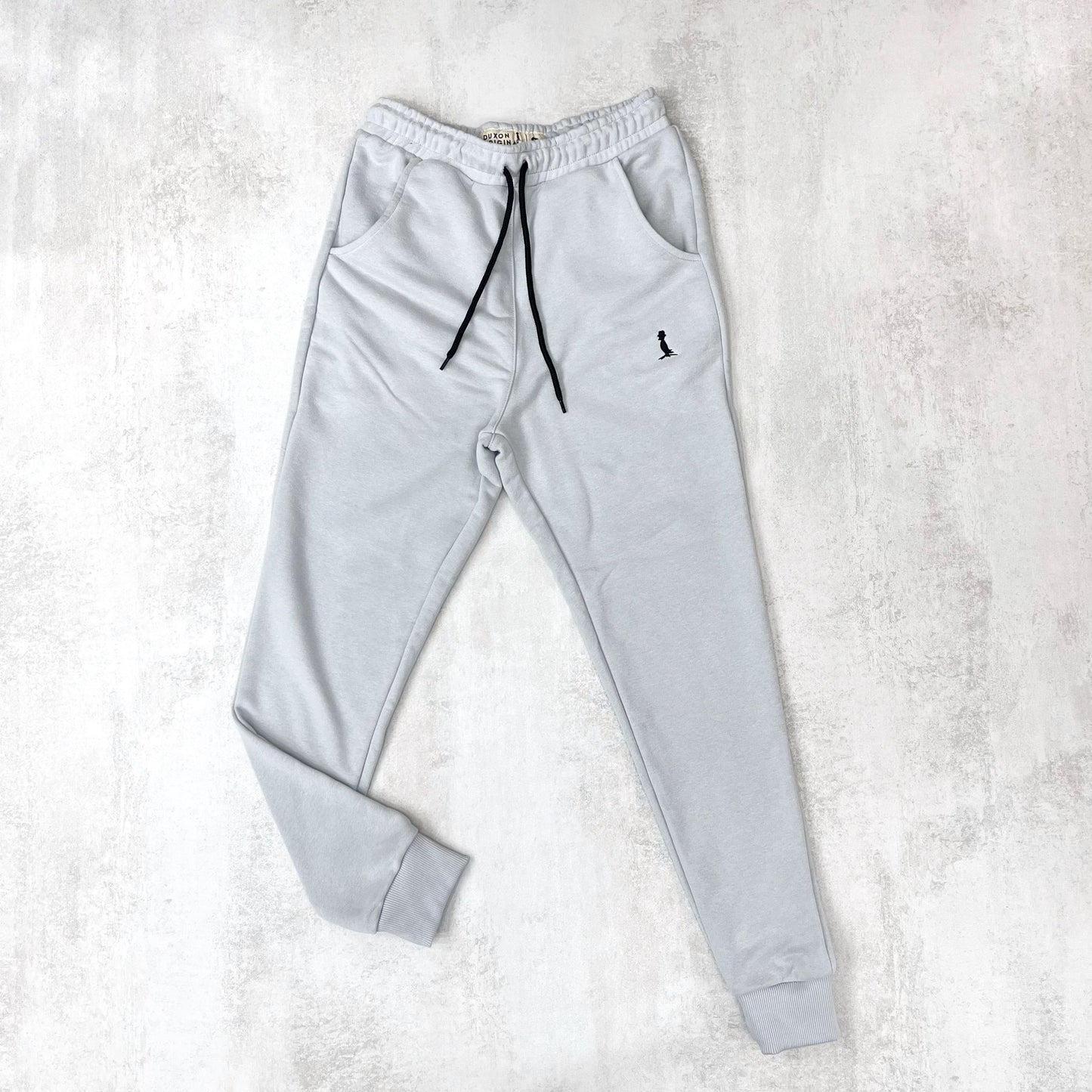 JOGGER CON PUÑO COLOR GRIS CLARO