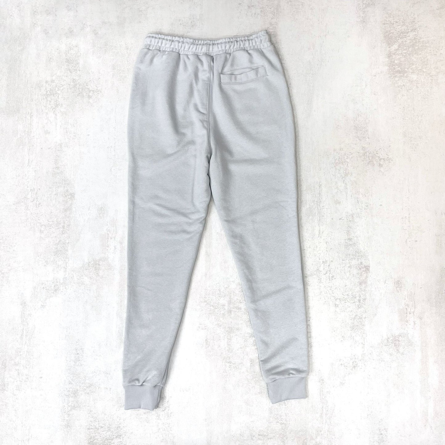 JOGGER CON PUÑO COLOR GRIS CLARO