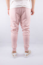 PANTALON JOGGER CON PUÑO ROSADO