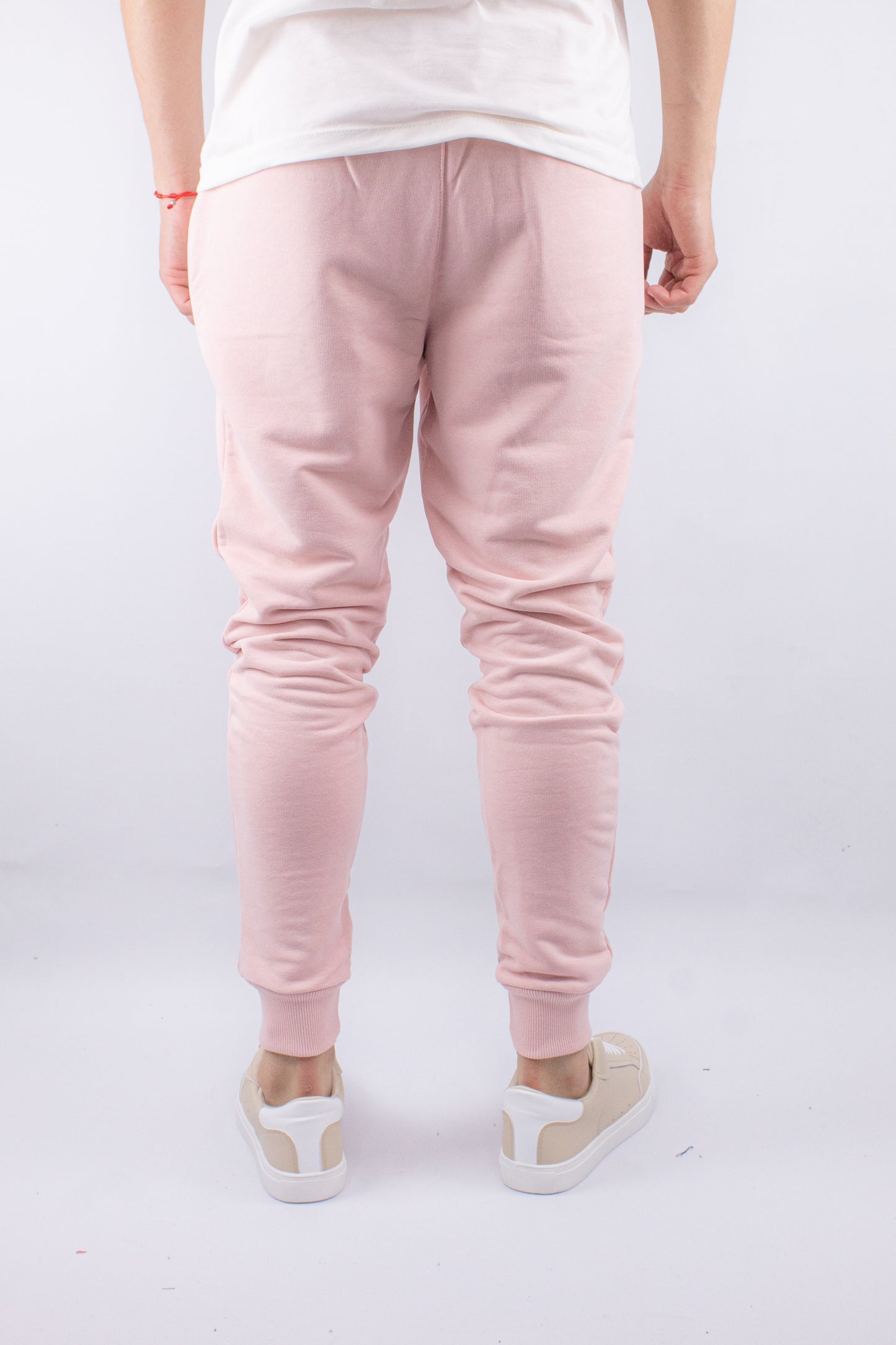 PANTALON JOGGER CON PUÑO ROSADO