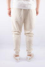 PANTALON JOGGER CON PUÑO BEIGE