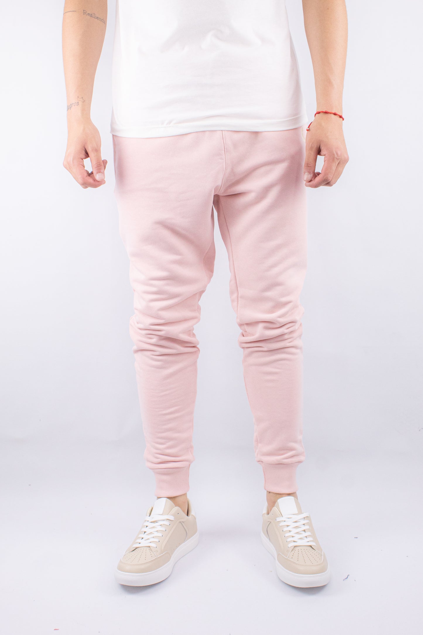 PANTALON JOGGER CON PUÑO ROSADO